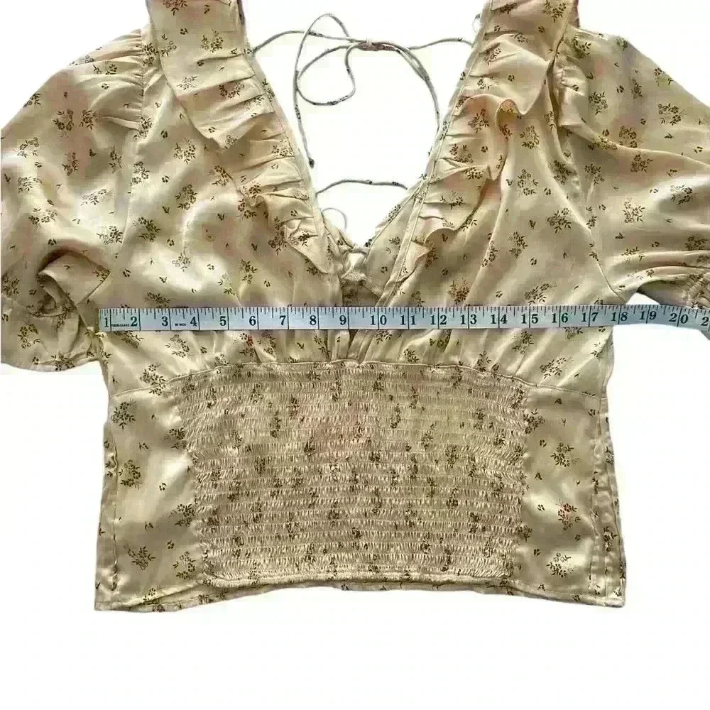 FREE PEOPLE Isabella Silky Floral Ruffle Babydoll Blouse in Copper‎ color